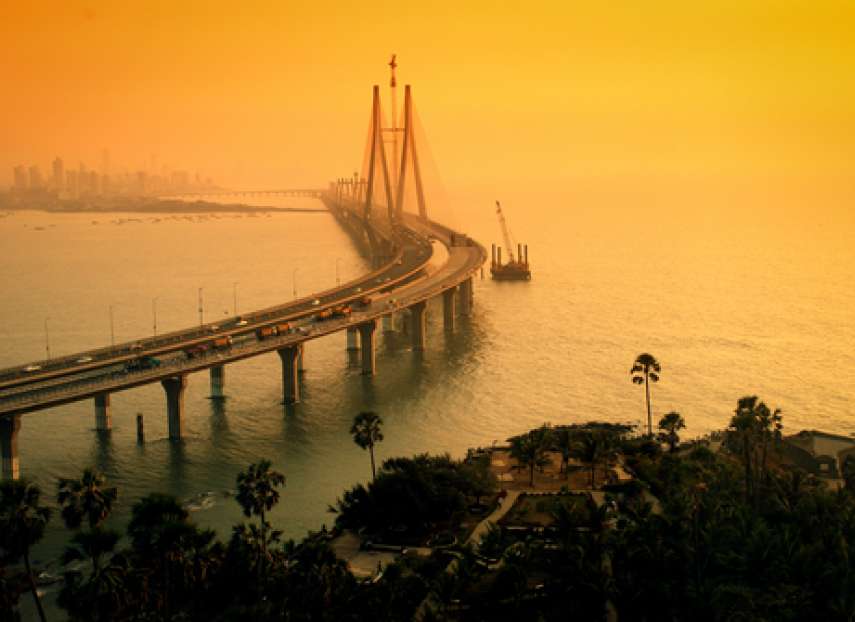 The Bandra-Worli Sea Link, also called Rajiv Gandhi Sea Link at dusk. It is a cable-stayed vehicular bridge that links Bandra in the northern suburb of Mumbai with Worli in South Mumbai. T+1 settlement cycles
